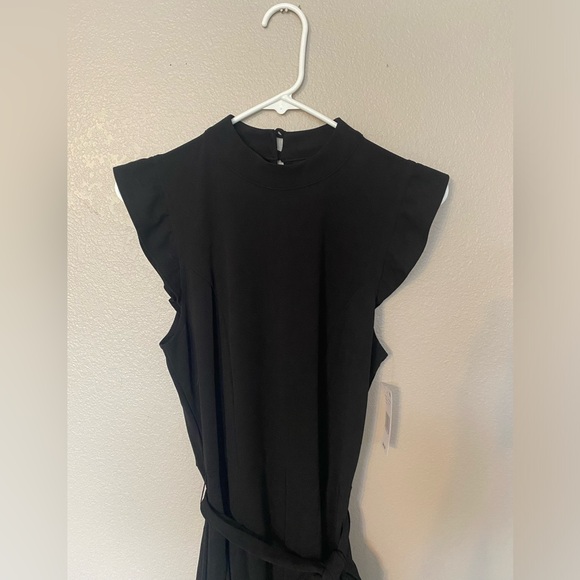 Moa Moa brand Black High Neck Flutter Sleeve Tie Waist Jumpsuit Size Large NWT - Picture 4 of 8